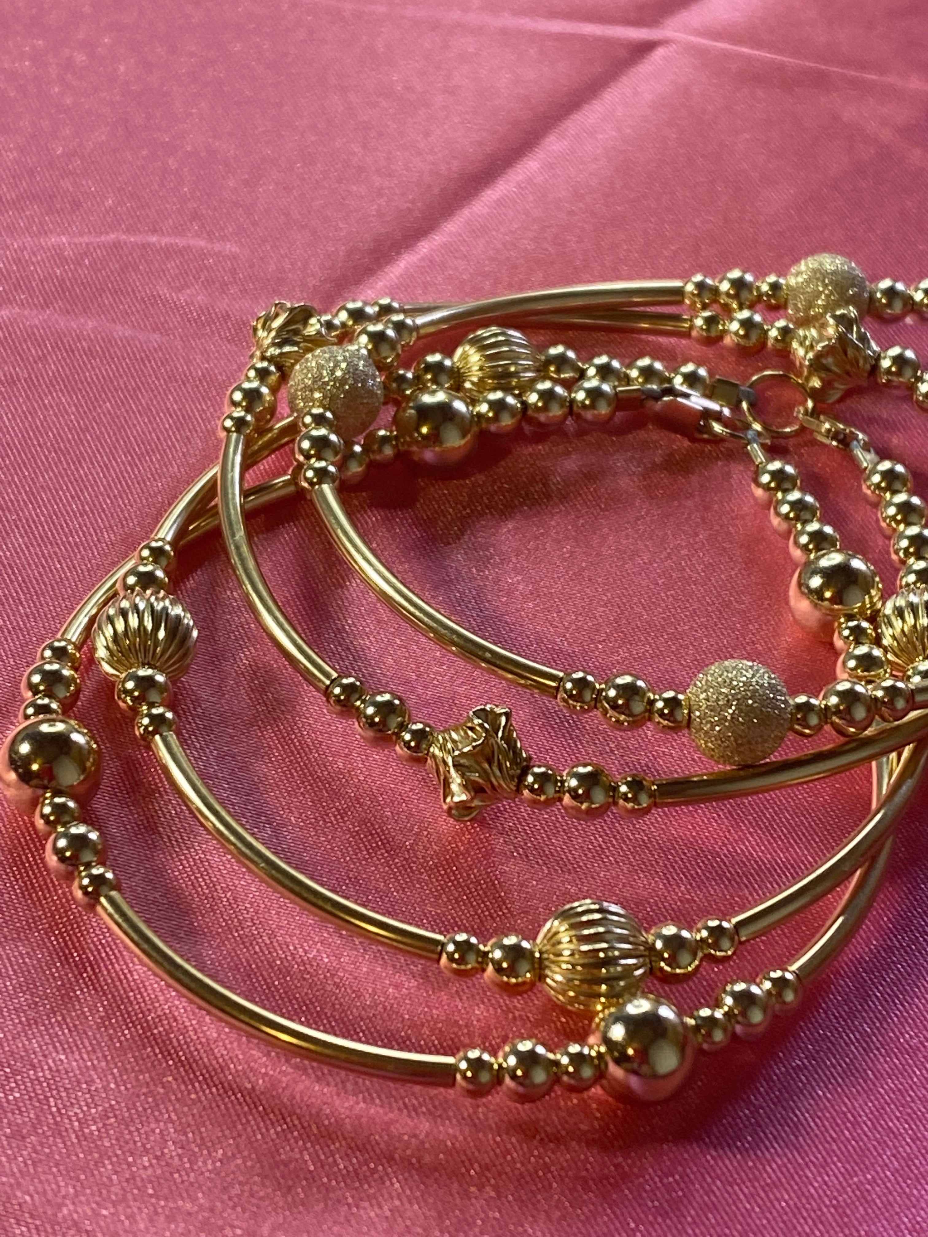 Gold bangles 21k. Size 20. W 9.40 g. Price for 2 Pieces - Shatha Salil for  jewelry